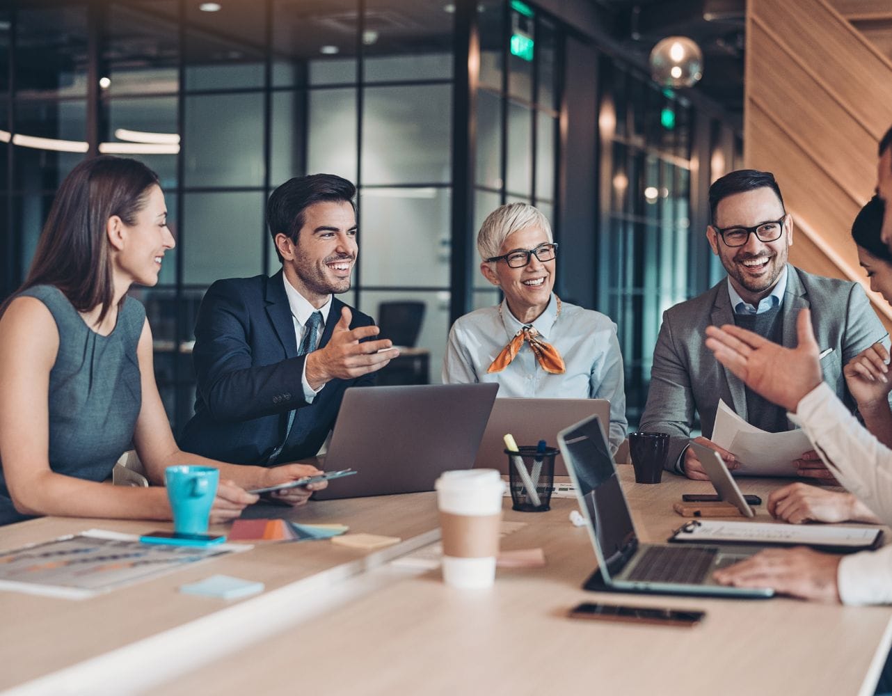 Colleagues work through intergenerational collaboration to improve teamwork