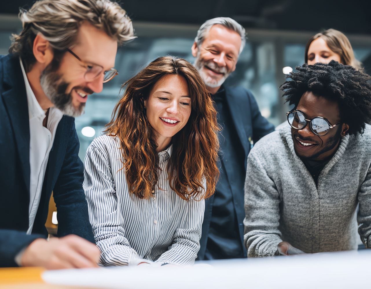 Team lead collaborates with colleagues during a design thinking workshop in Cyprus