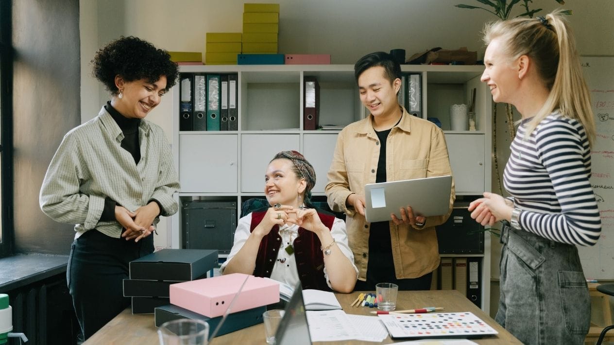 colleagues sharing ideas and discussing solutions during a meeting