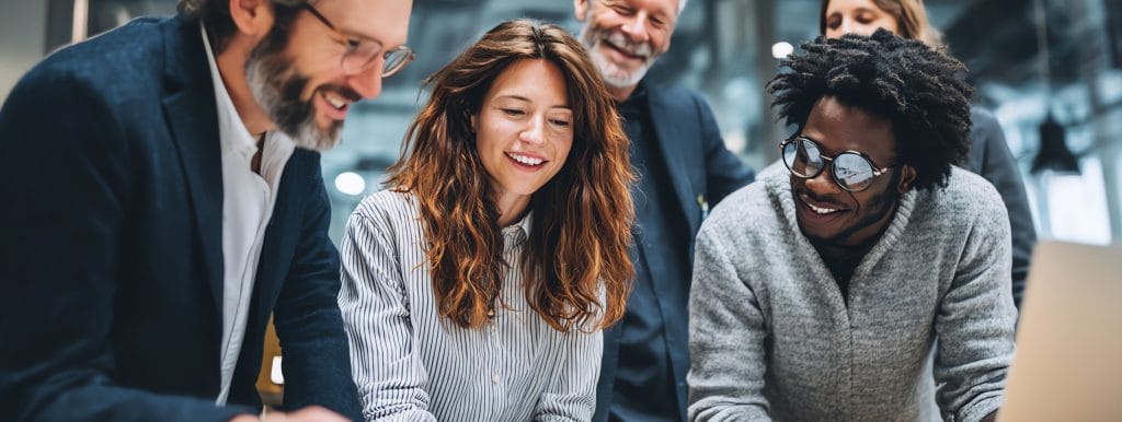 team members applying what they learned during an intergenerational collaboration workshop