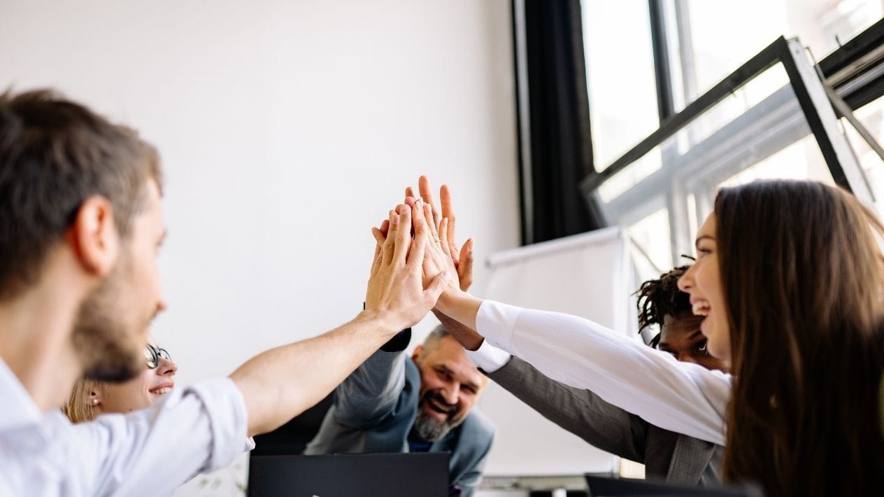 professionals practising inclusive communication during a meeting at the office